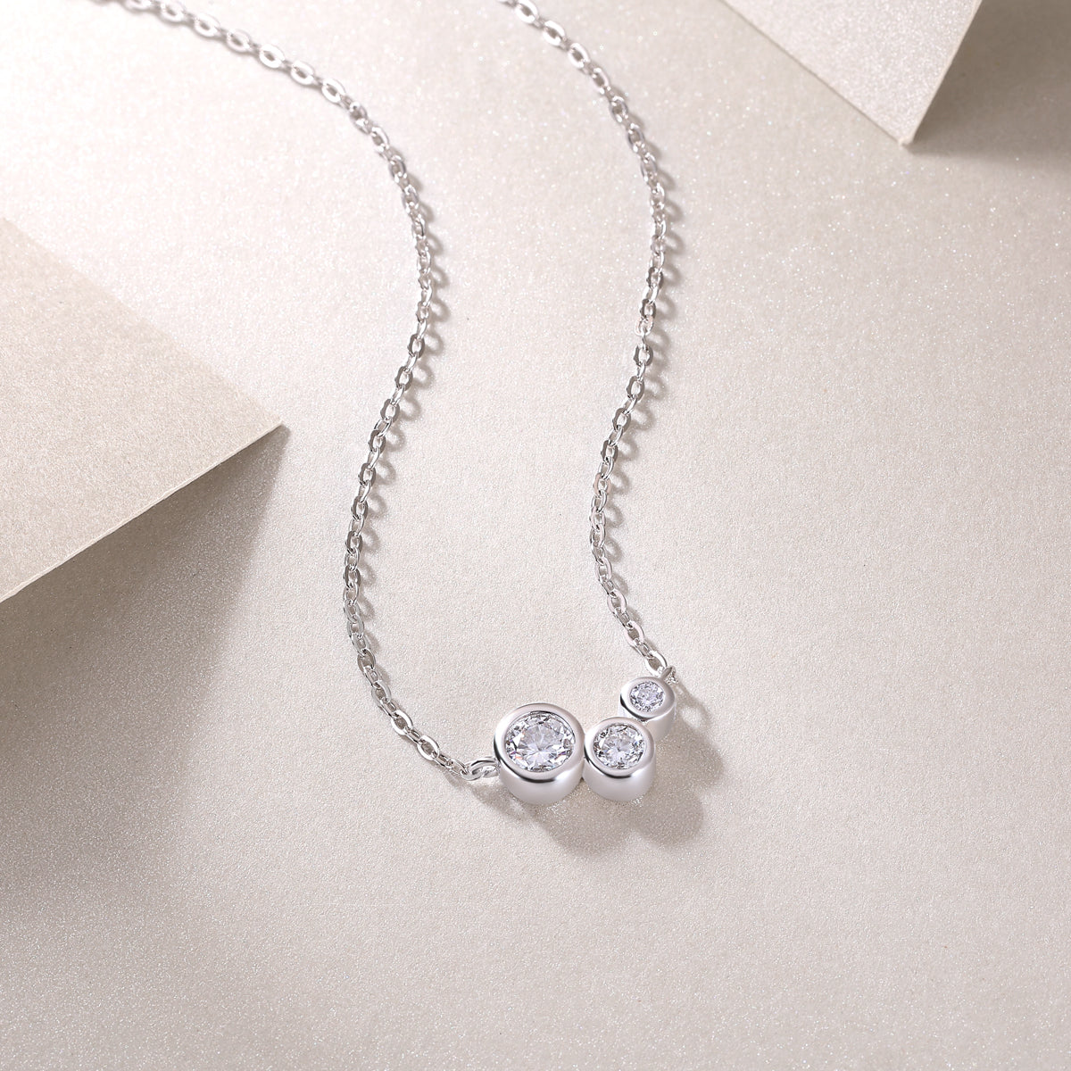 Three-Stone Bezel-Set Moissanite Bubble Necklace in 925 Sterling Silver