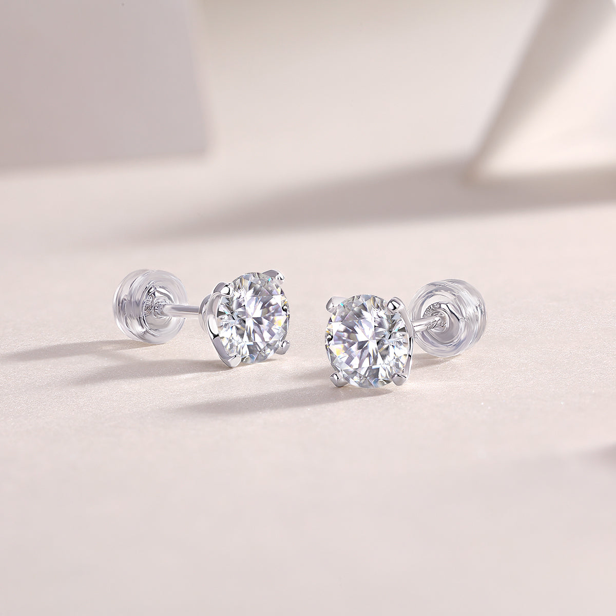 Round Moissanite Four-Prong Stud Earrings in 925 Sterling Silver
