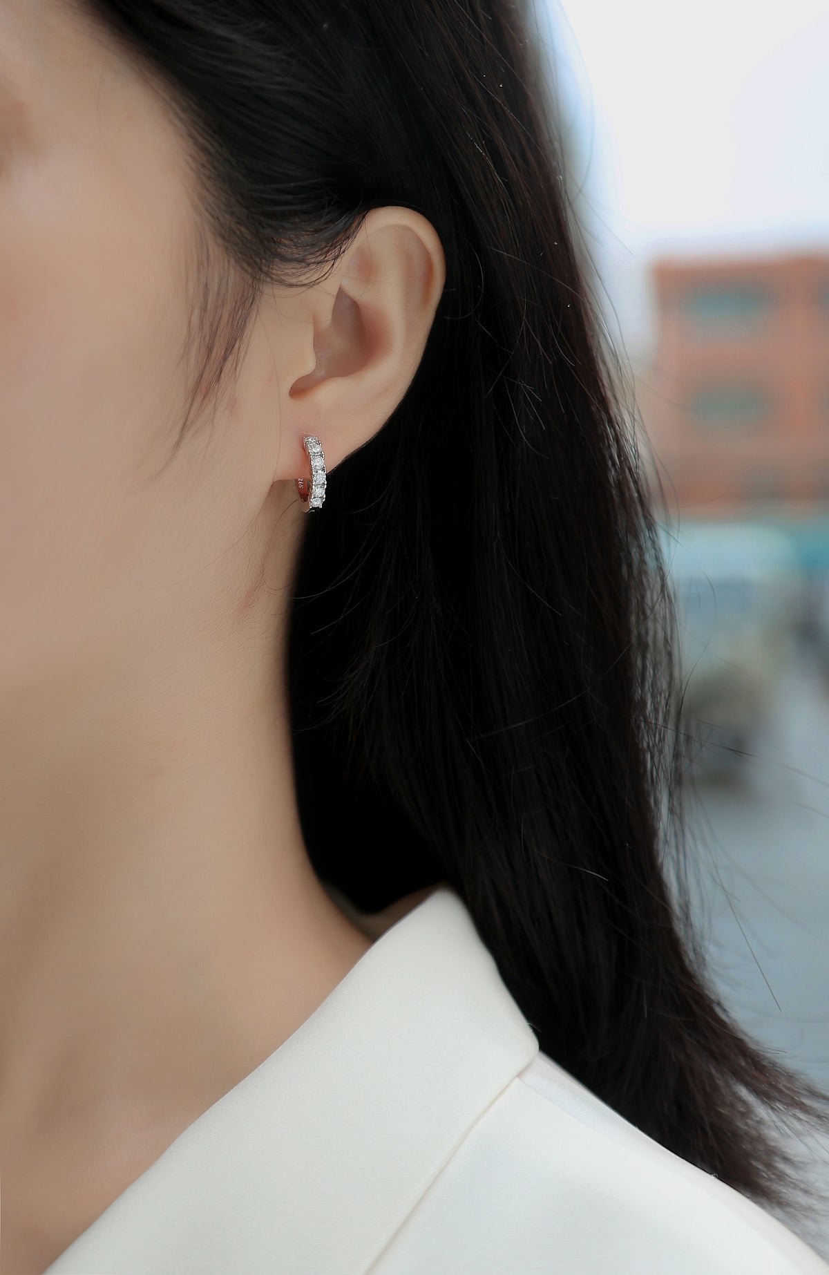 Round Moissanite Prong-Set Huggie Hoop Earrings in 925 Silver - worn