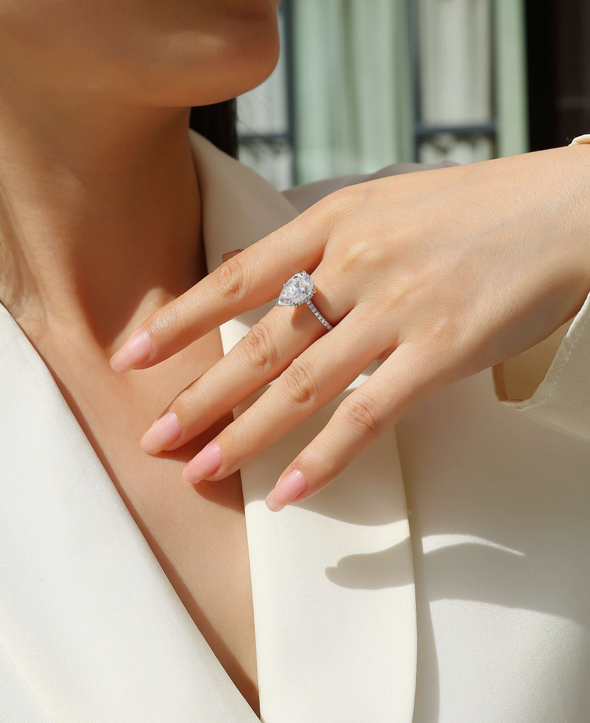 Pear Moissanite Hidden-Halo Solitaire Ring in 925 Sterling Silver - worn