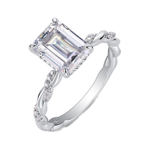 Emerald-Cut Moissanite Solitaire with Twisted Pave Band in 925 Silver