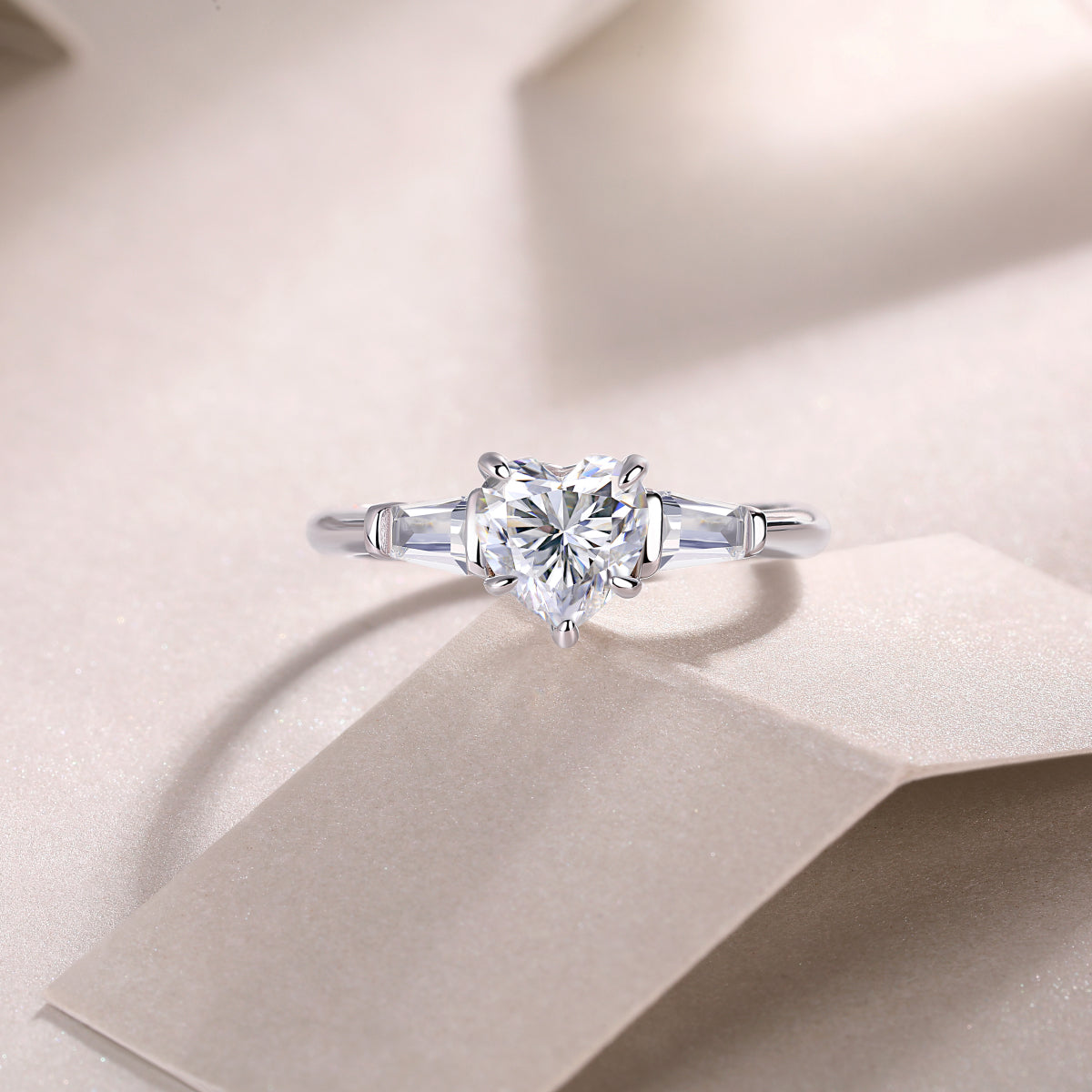 Heart Moissanite Ring with Tapered Baguette Side Stones in 925 Silver