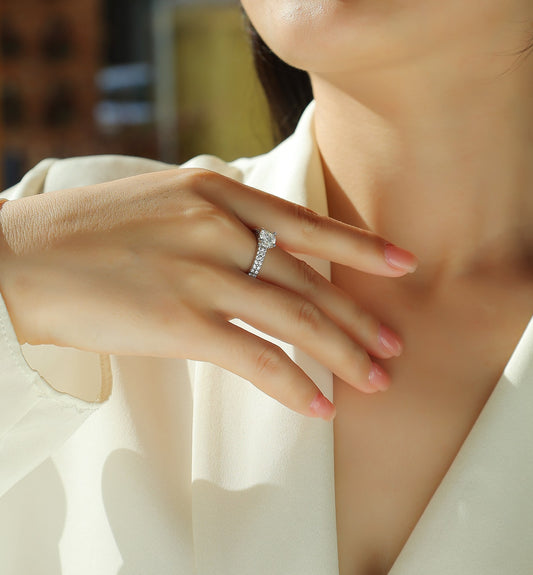 Round Moissanite Solitaire Ring with Shared-Prong Band in 925 Silver - worn