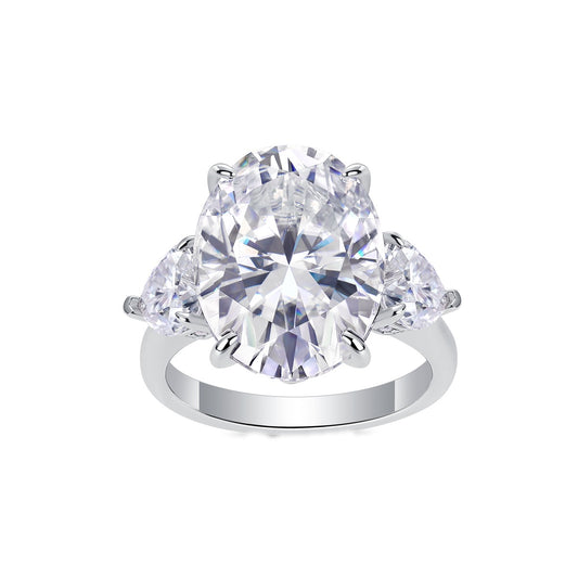 Oval Moissanite Three-Stone Ring with Pear Sides in 925 Silver
