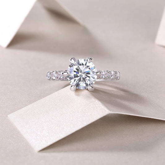 Round Moissanite Six-Prong Solitaire with Patterned Pave Band in 925 Silver