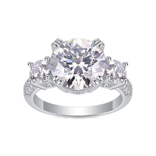 Round Moissanite Three-Stone Ring with Pave Band in 925 Sterling Silver
