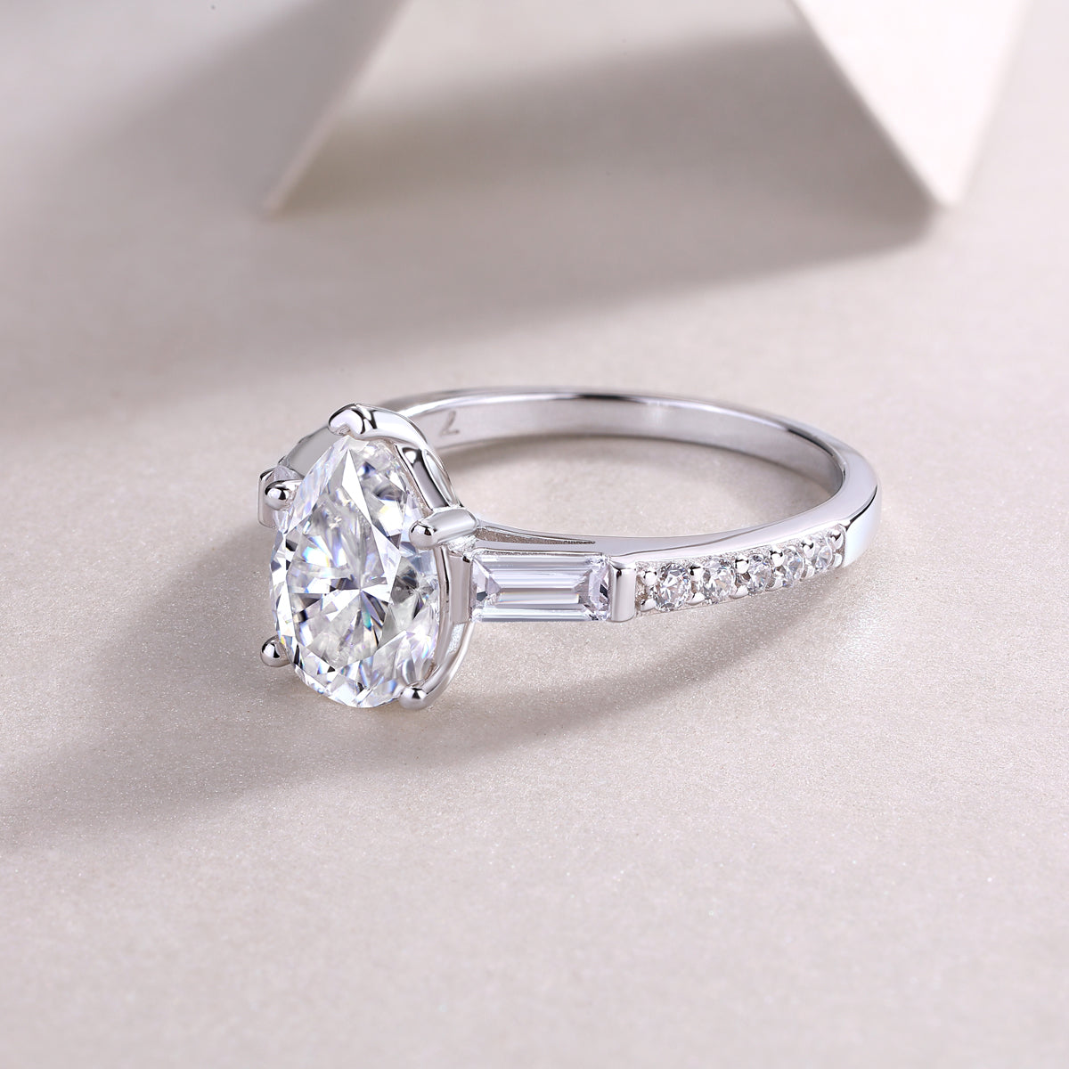 Pear Moissanite Ring with Baguette Side Stones in 925 Sterling Silver