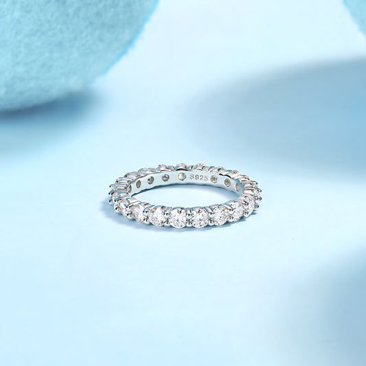 Round Moissanite Four-Prong Eternity Band in 925 Sterling Silver
