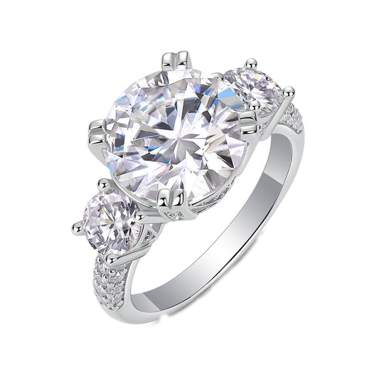 Round Moissanite Three-Stone Ring with Pave Band in 925 Sterling Silver