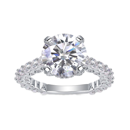 Round Moissanite Four-Prong Solitaire with Pave Band in 925 Silver
