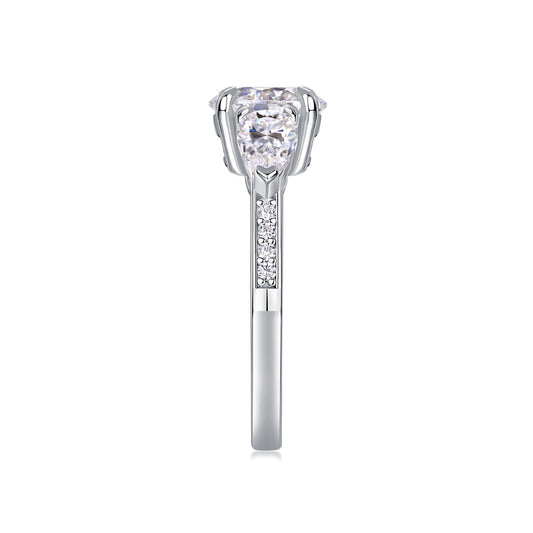 Round Moissanite Ring with Pear Side Stones in 925 Sterling Silver