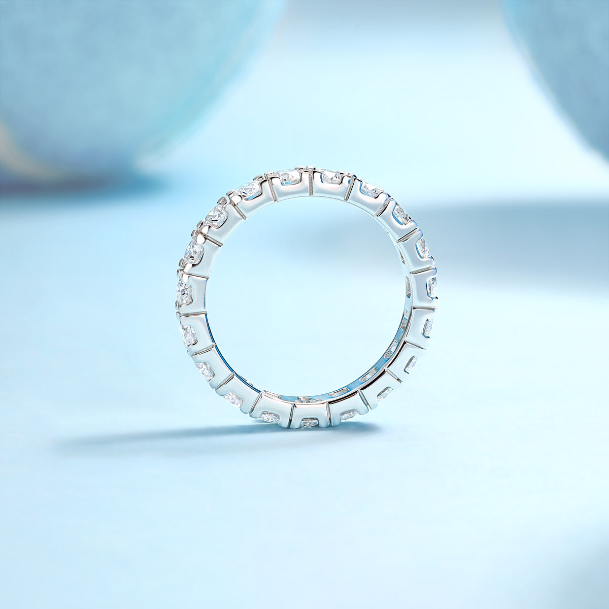 Round Moissanite Shared-Prong Eternity Band in 925 Sterling Silver