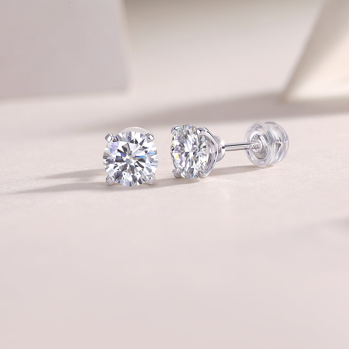Round Moissanite Four-Prong Stud Earrings in 925 Sterling Silver