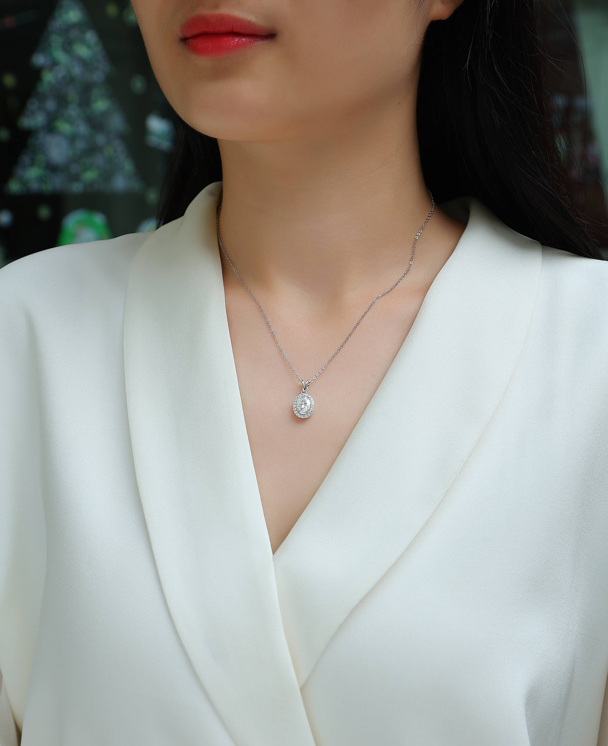Oval Moissanite Halo Pendant Necklace in 925 Sterling Silver - worn