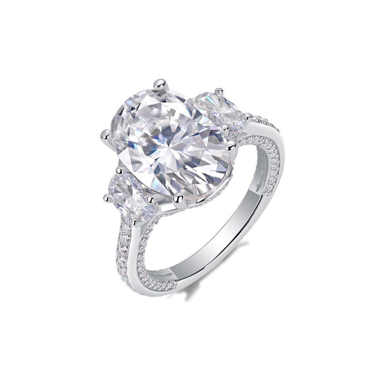 Oval Moissanite Three-Stone Ring with Half-Moon Sides in 925 Silver