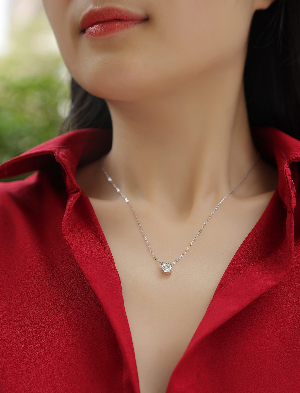 Round Moissanite Four-Prong Solitaire Necklace in 925 Sterling Silver - worn