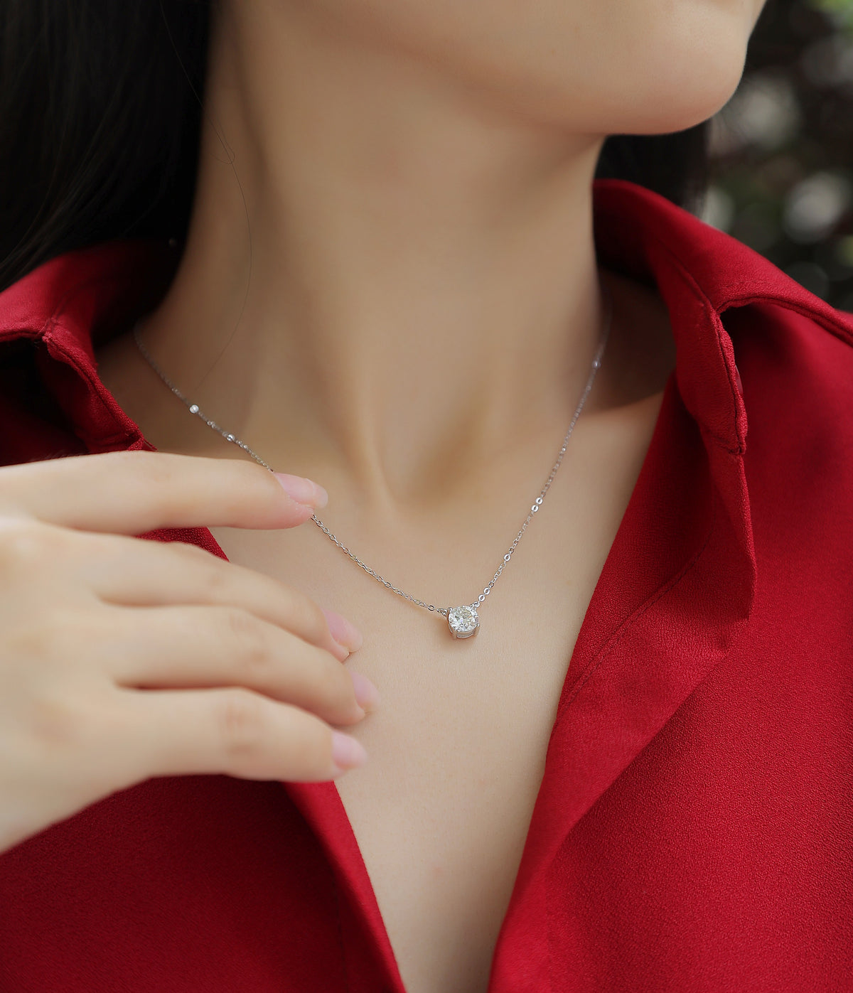 Round Moissanite Four-Prong Solitaire Necklace in 925 Sterling Silver - worn
