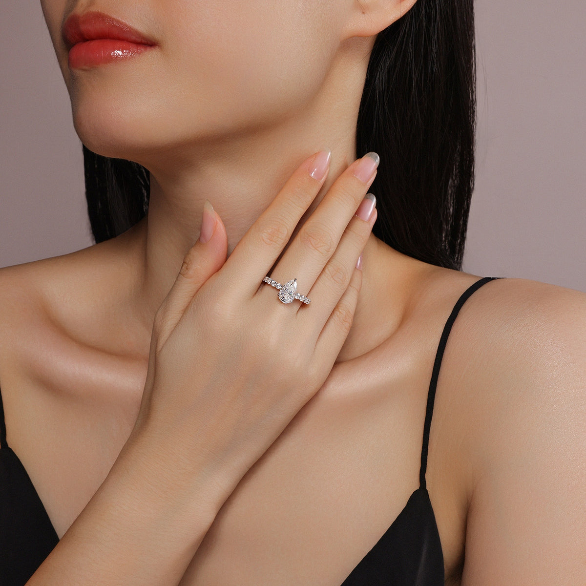 Pear Moissanite Solitaire with Marquise and Round Band in 925 Silver - worn