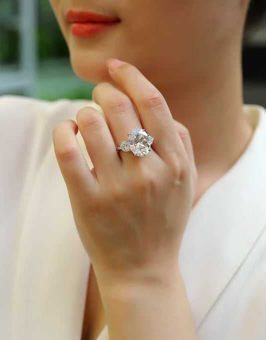 Oval Moissanite Three-Stone Ring with Pear Sides in 925 Silver - worn