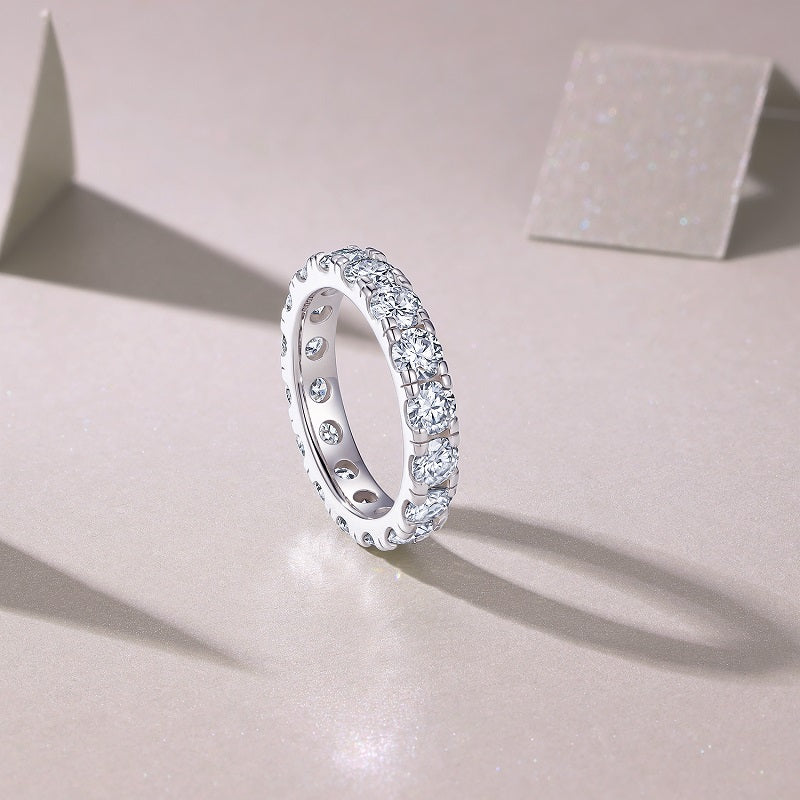 Round Moissanite Bold Shared-Prong Eternity Band in 925 Silver
