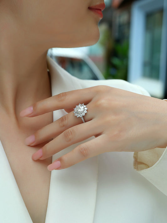 Round Moissanite Sunflower Halo Ring with Pear Petals in 925 Silver - worn