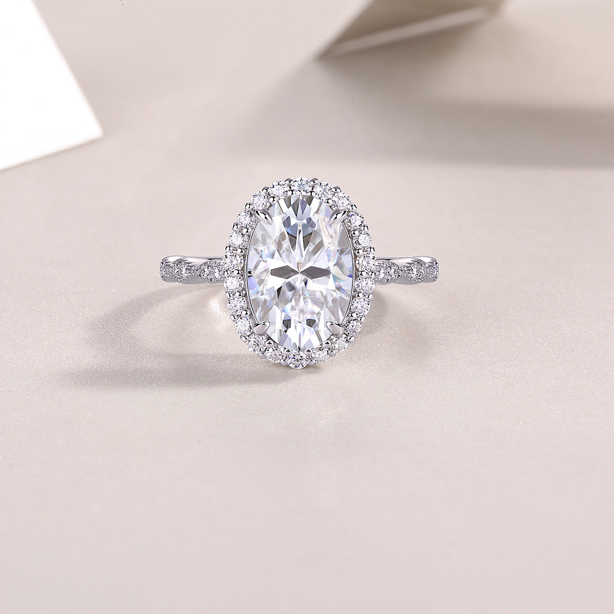 Oval Moissanite Halo Ring with Twisted Pave Band in 925 Silver
