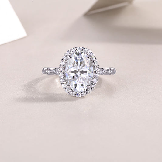 Oval Moissanite Halo Ring with Twisted Pave Band in 925 Silver