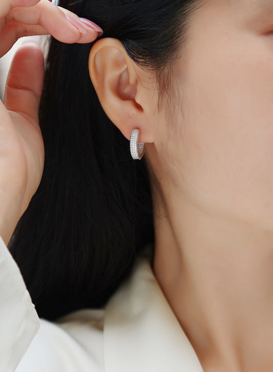 Moissanite Three-Row Pave Huggie Hoop Earrings in 925 Sterling Silver - worn