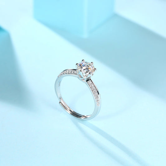 Six-Prong Round Moissanite Ring with Pave Band in 925 Sterling Silver