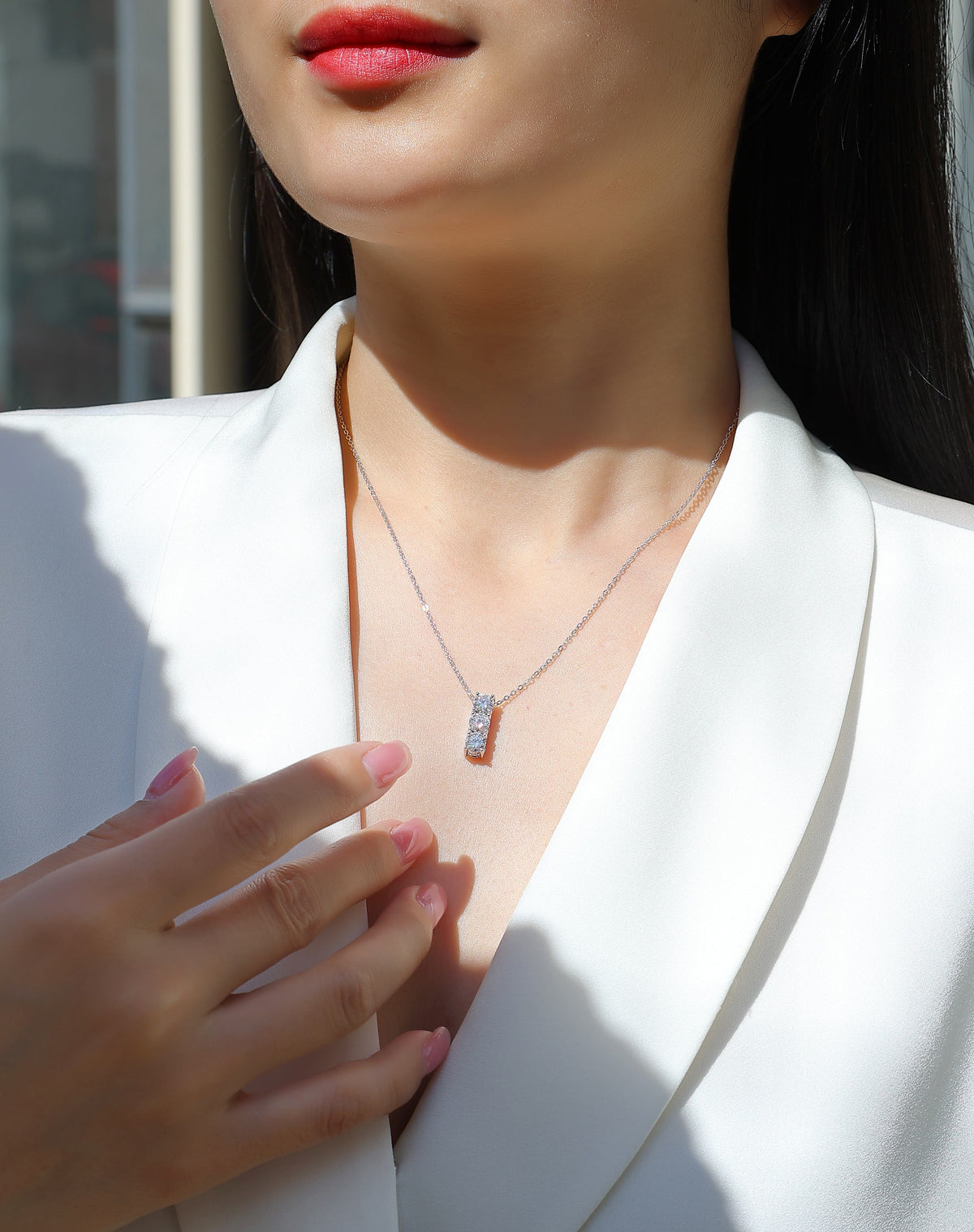 Three-Stone Round Moissanite Bar Pendant Necklace in 925 Sterling Silver - worn