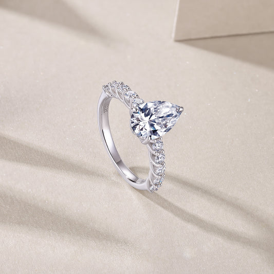 Pear Moissanite Solitaire with Marquise and Round Band in 925 Silver