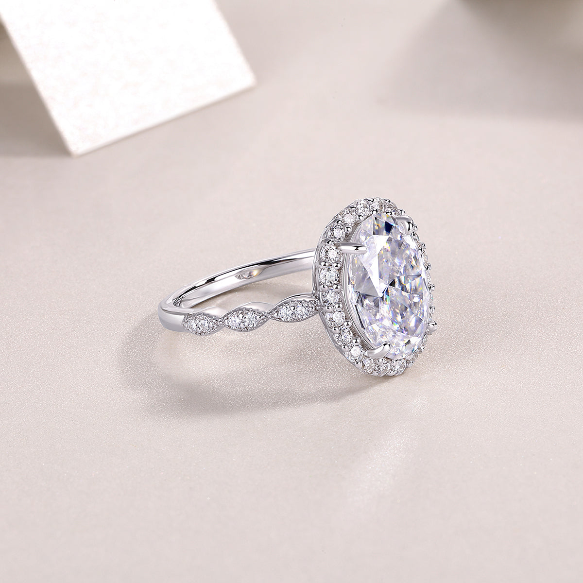 Oval Moissanite Halo Ring with Twisted Pave Band in 925 Silver