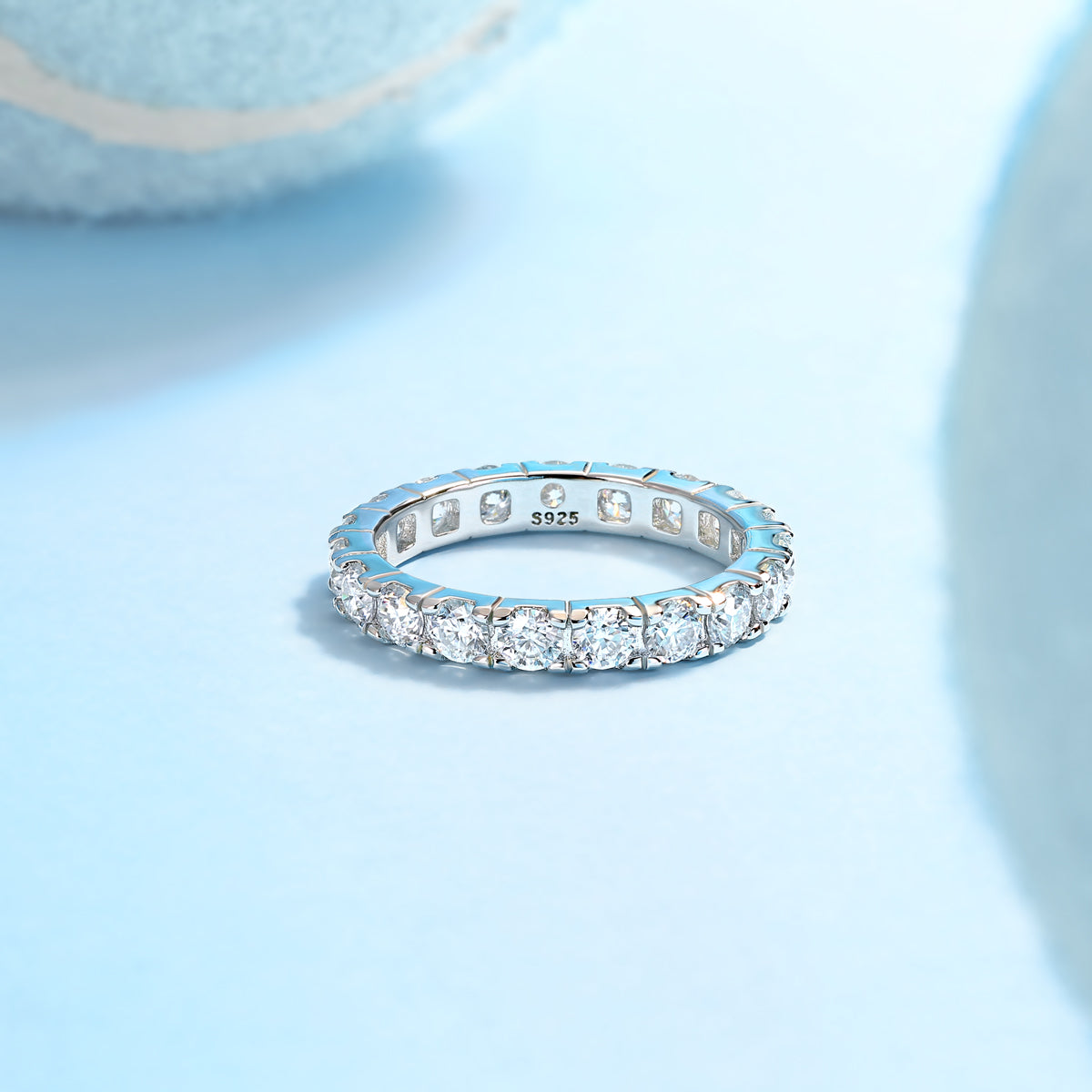 Round Moissanite Shared-Prong Eternity Band in 925 Sterling Silver
