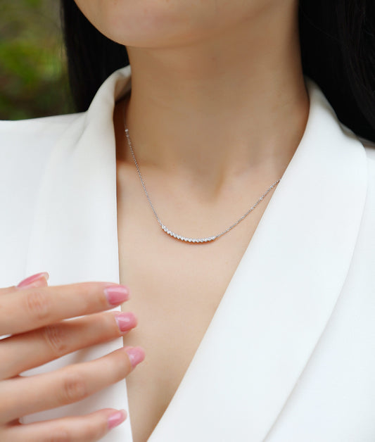 Bezel-Set Moissanite Curved Bar Necklace in 925 Sterling Silver - worn