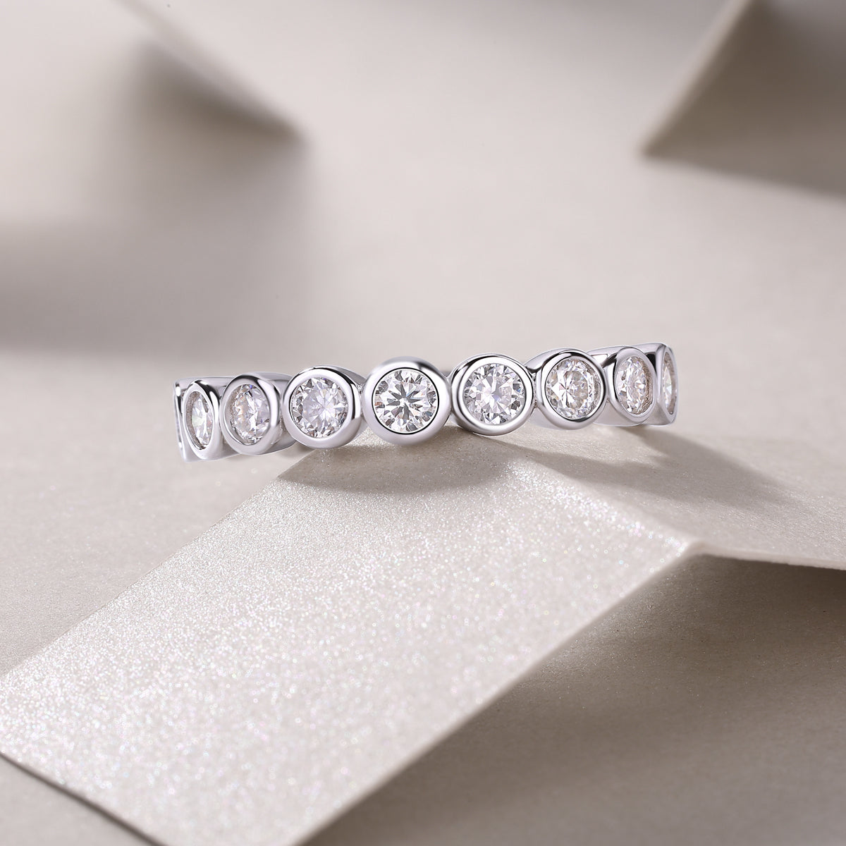 Round Moissanite Bezel-Set Eternity Band in 925 Sterling Silver