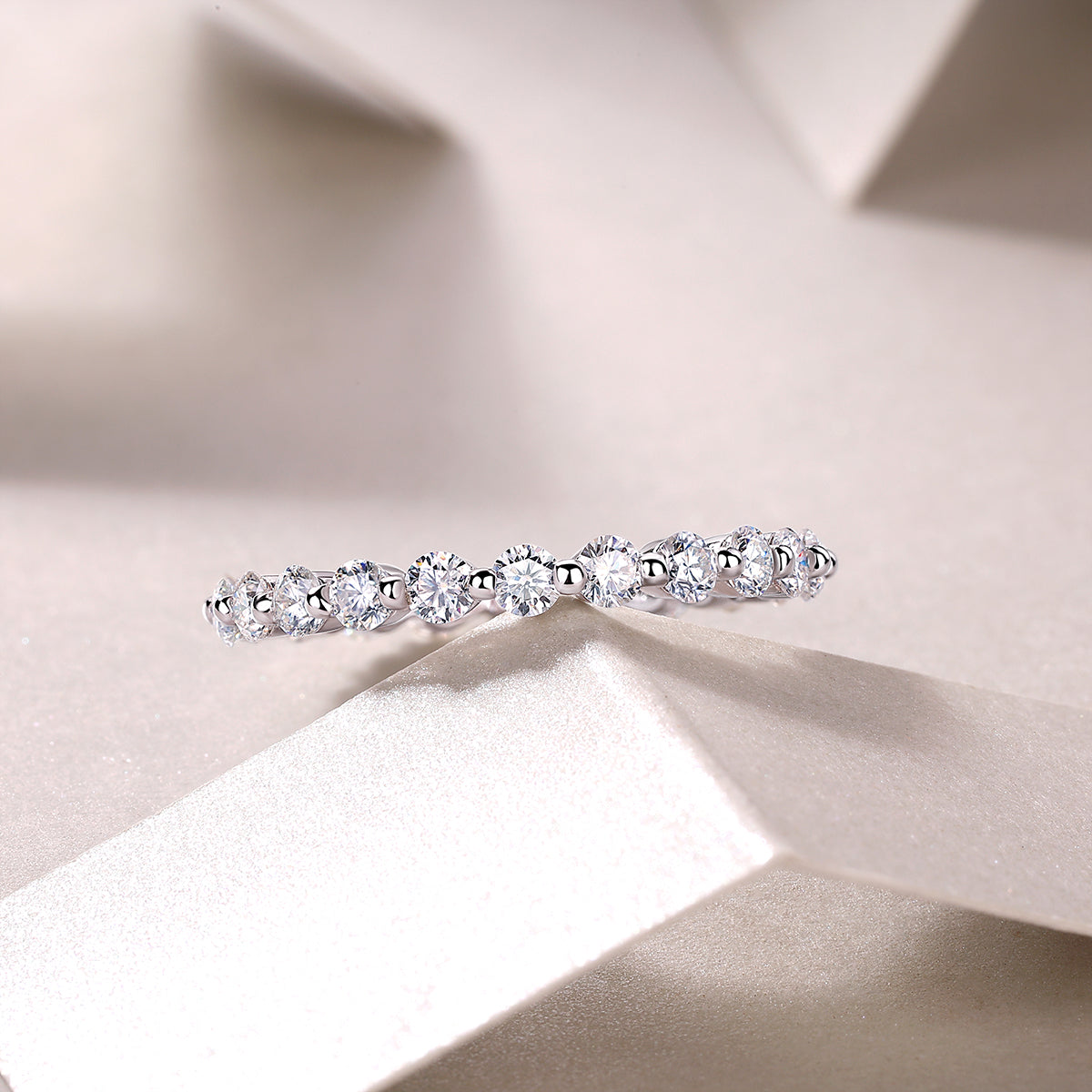 Moissanite Floating Station Eternity Band in 925 Sterling Silver