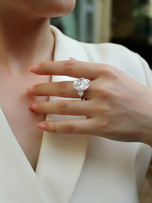 Oval Moissanite Three-Stone Ring with Pear Sides in 925 Silver - worn