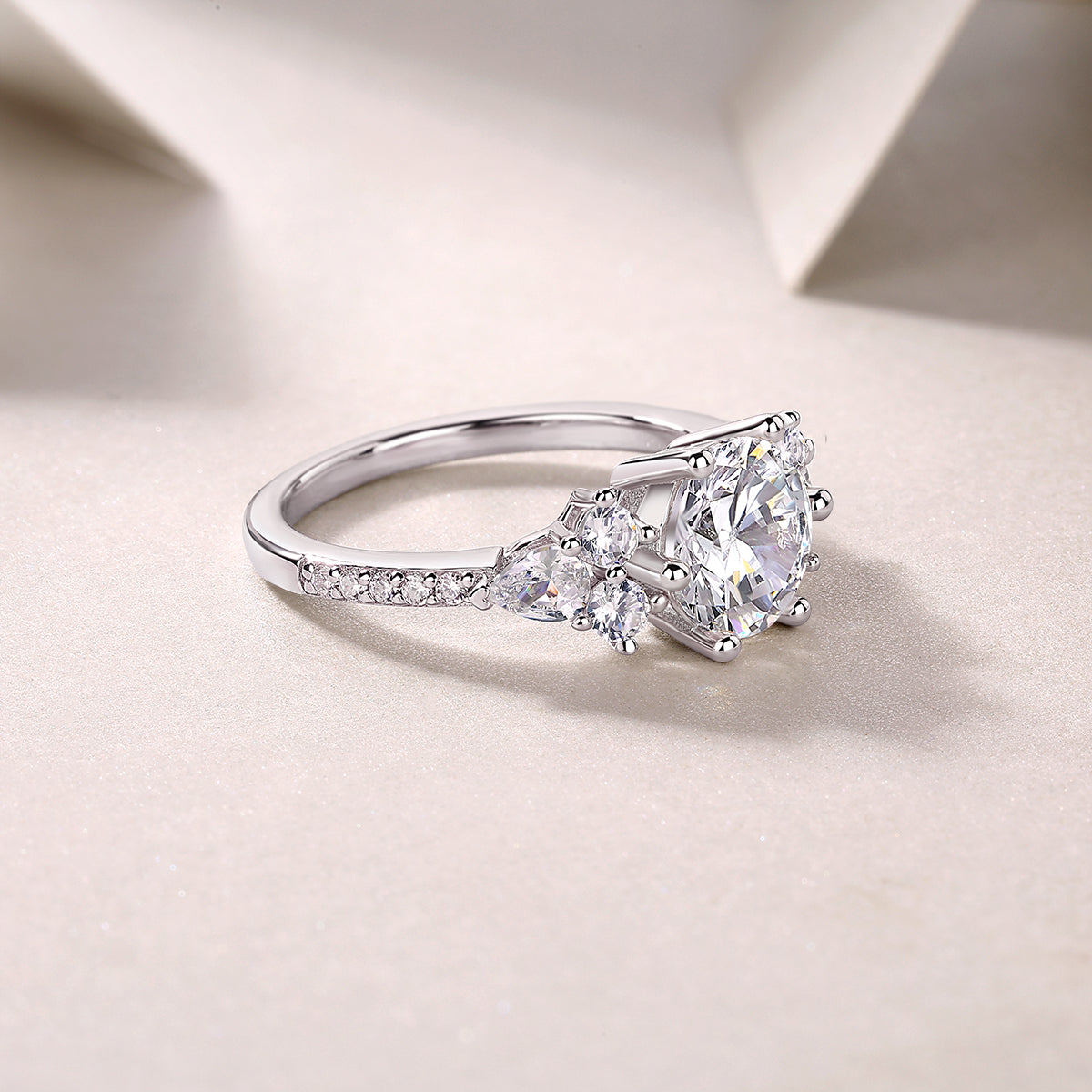 Round Moissanite Engagement Ring with Cluster Shoulders in 925 Silver