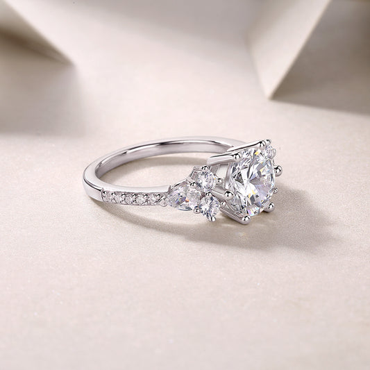 Round Moissanite Engagement Ring with Cluster Shoulders in 925 Silver