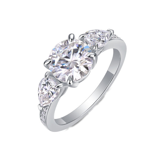 Round Moissanite Ring with Pear Side Stones in 925 Sterling Silver