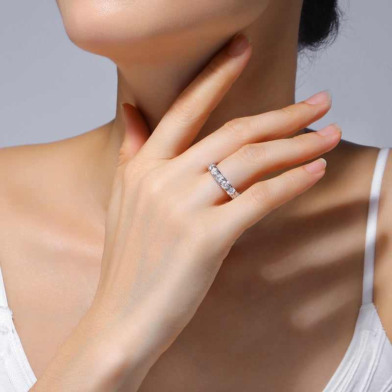Round Moissanite Bold Shared-Prong Eternity Band in 925 Silver - worn