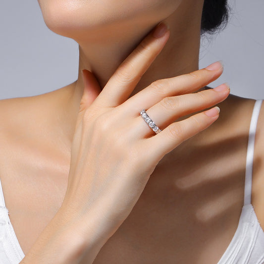 Round Moissanite Bold Shared-Prong Eternity Band in 925 Silver - worn