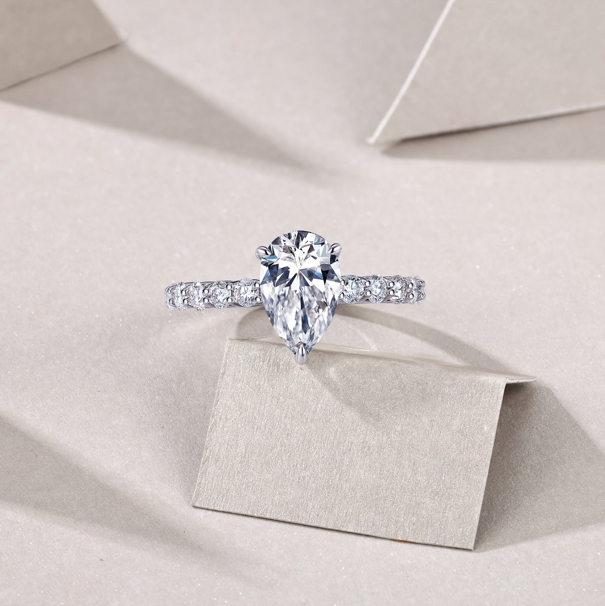 Pear Moissanite Solitaire with Marquise and Round Band in 925 Silver