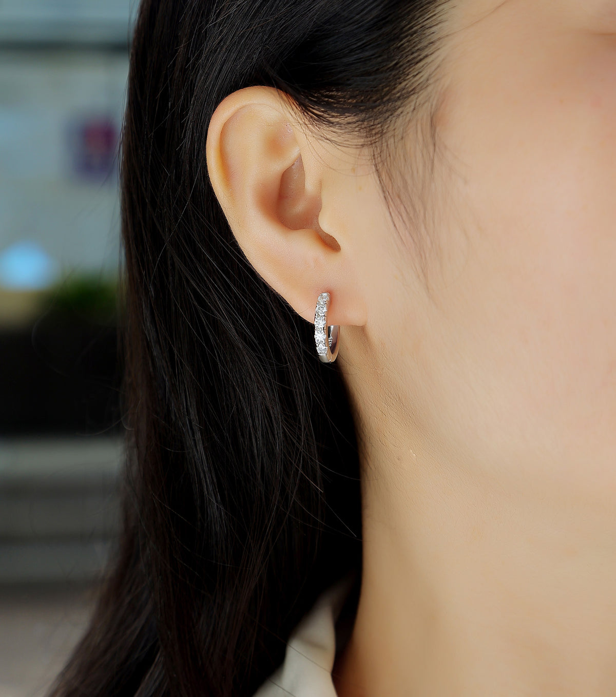 Moissanite Petite Pave Huggie Hoop Earrings in 925 Sterling Silver - worn