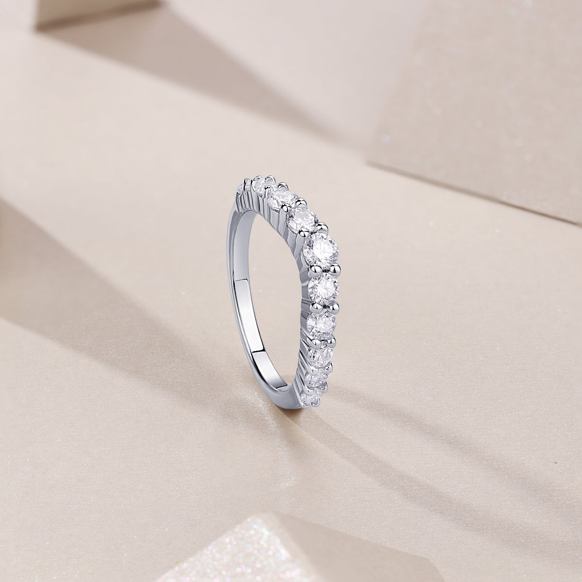 Round Moissanite Graduated Curved Band in 925 Sterling Silver