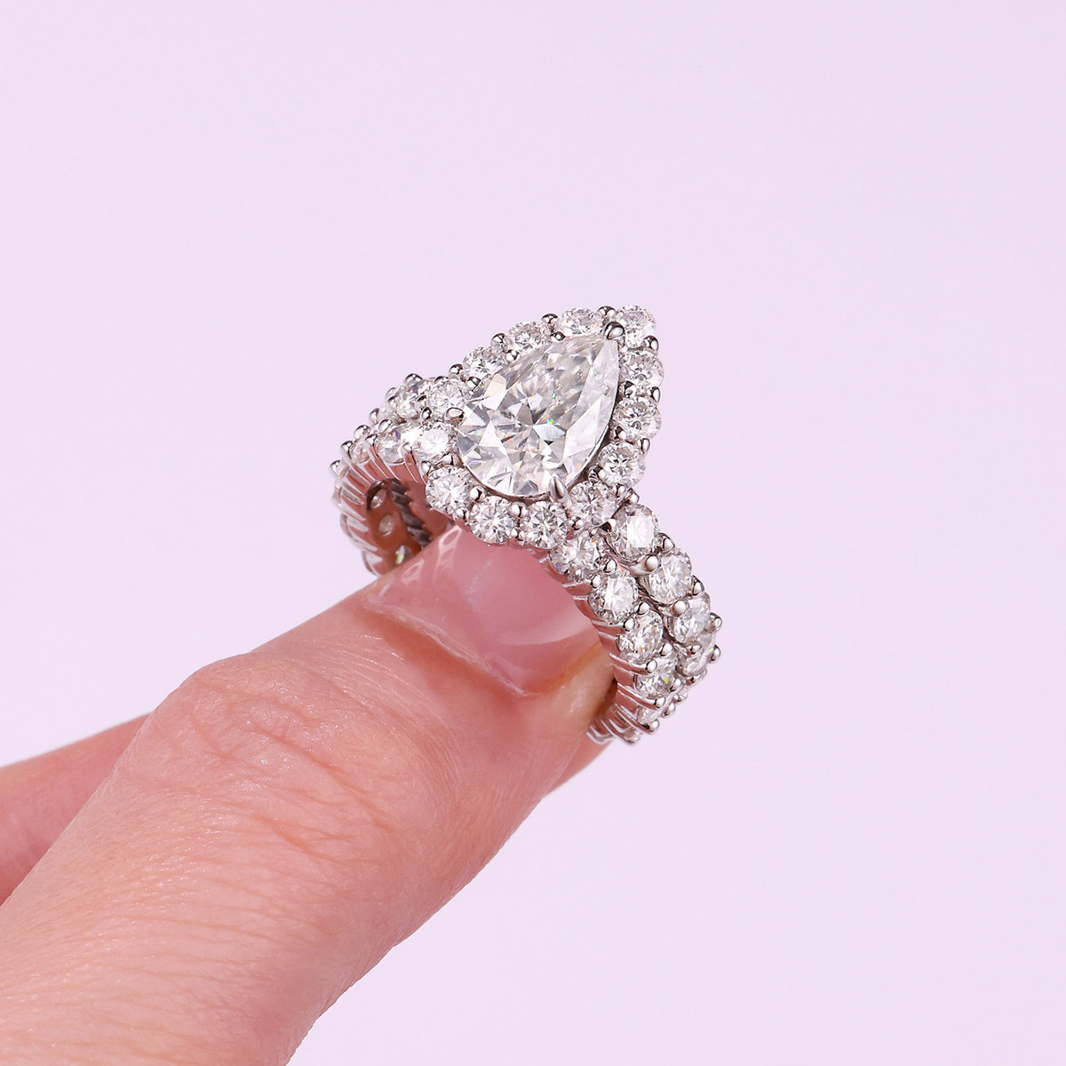 Pear Moissanite Halo Ring and Eternity Band Set in 925 Silver - worn