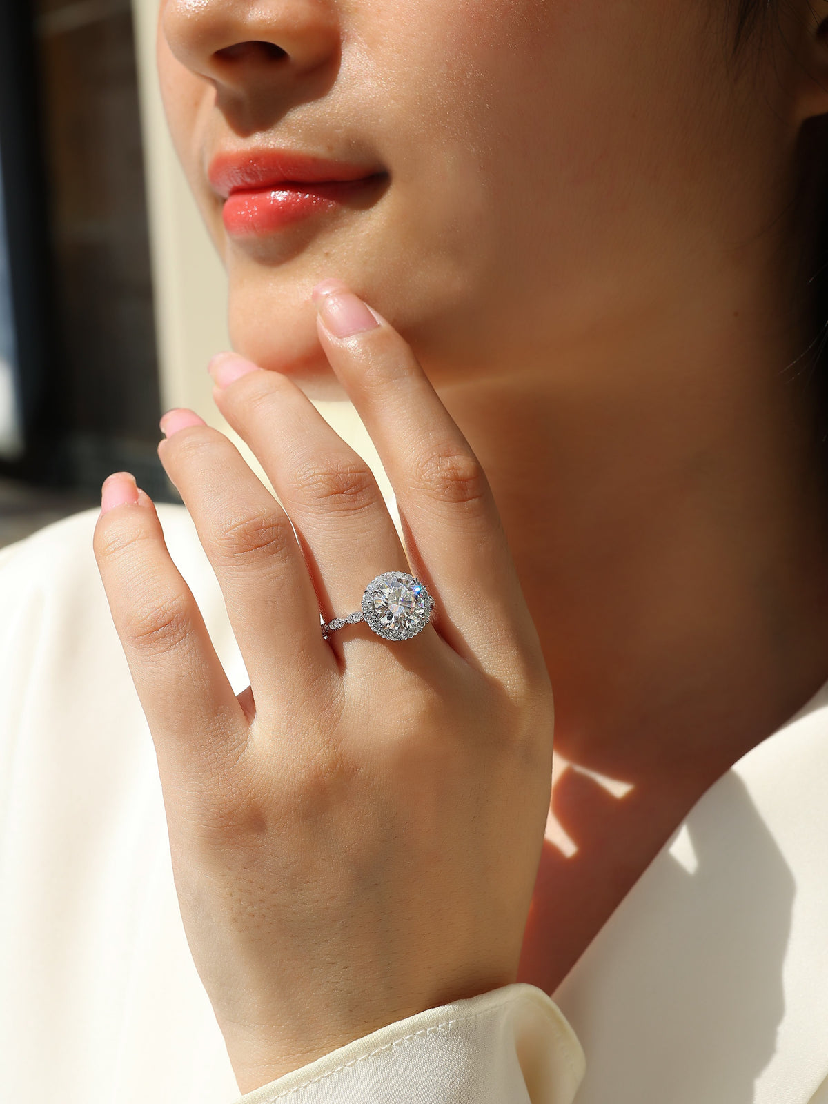 Round Moissanite Halo Ring with Twisted Pave Band in 925 Silver - worn