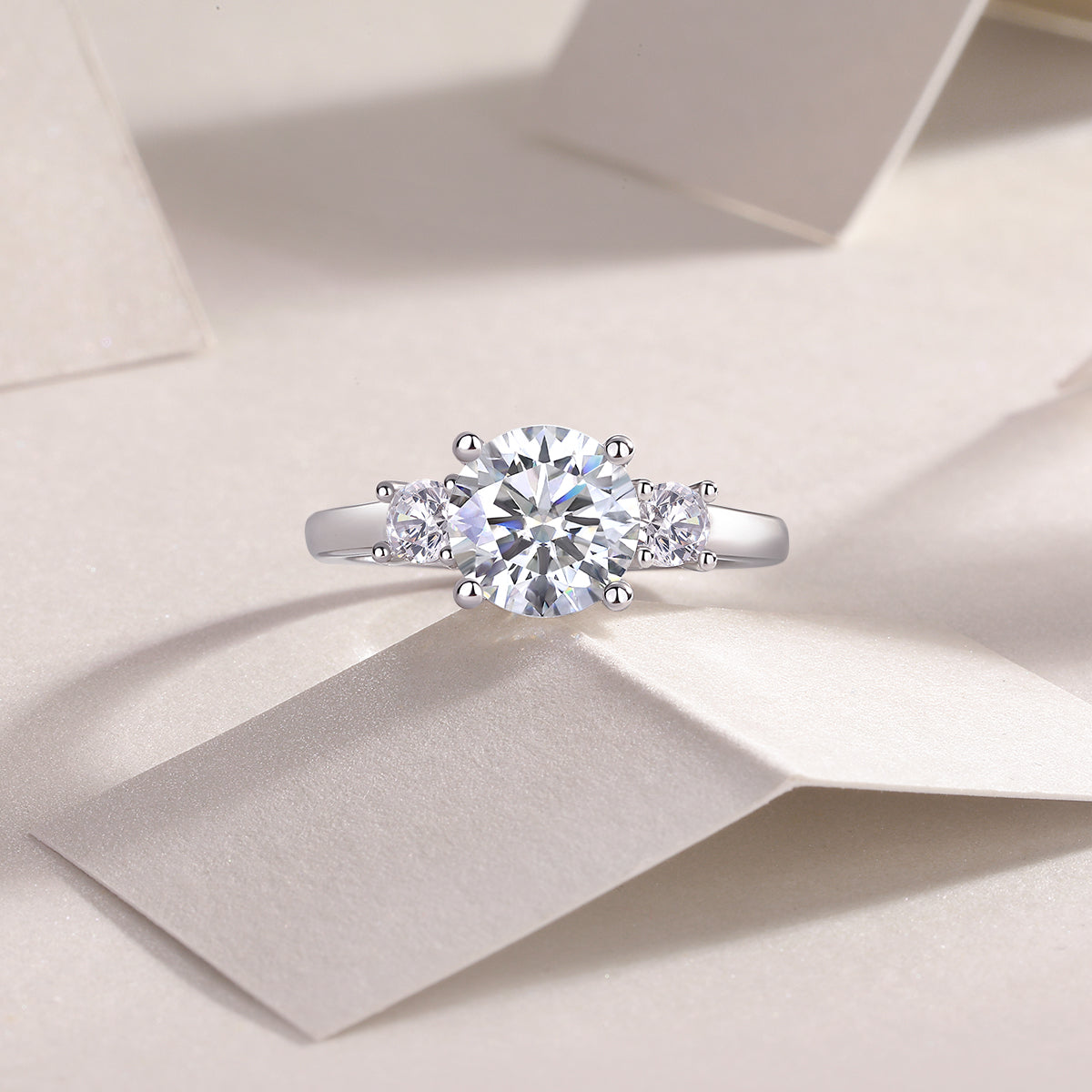 Round Moissanite Three-Stone Engagement Ring in 925 Sterling Silver