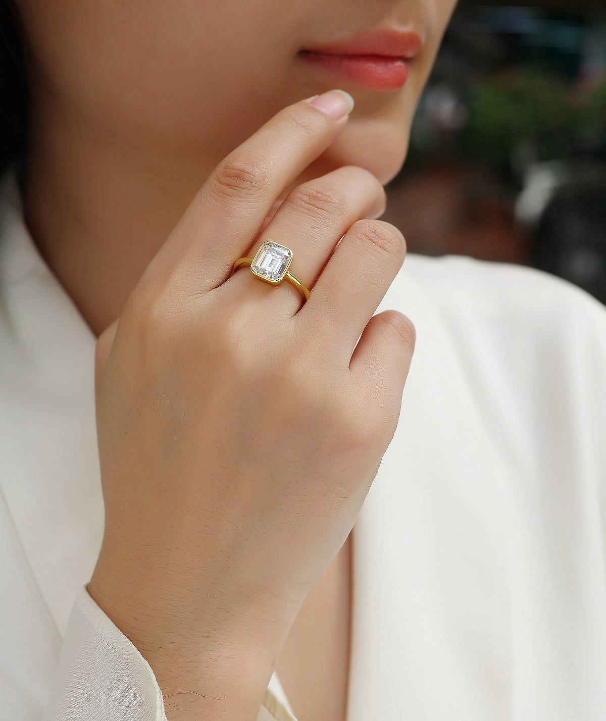 Emerald-Cut Moissanite Bezel Solitaire Ring in Gold-Plated 925 Silver - worn