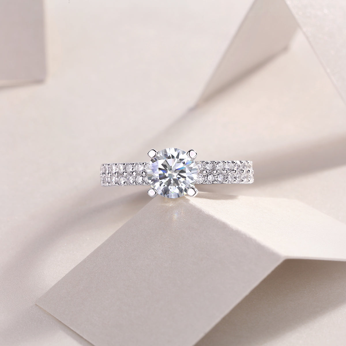 Round Moissanite Solitaire Ring with Shared-Prong Band in 925 Silver